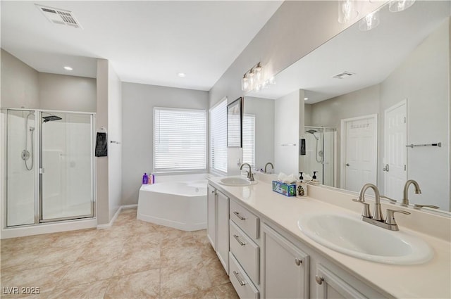 full bath featuring a sink, visible vents, and a stall shower