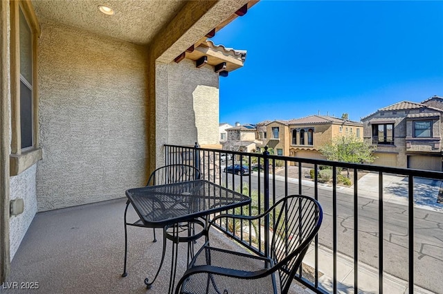 balcony featuring a residential view