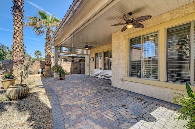 view of patio / terrace with ceiling fan and a fenced backyard