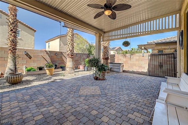 view of patio with a ceiling fan and a fenced backyard