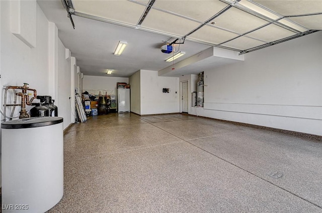 garage featuring fridge, a garage door opener, and water heater