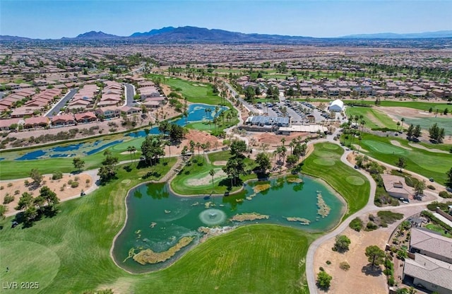 birds eye view of property with a residential view, golf course view, and a water and mountain view