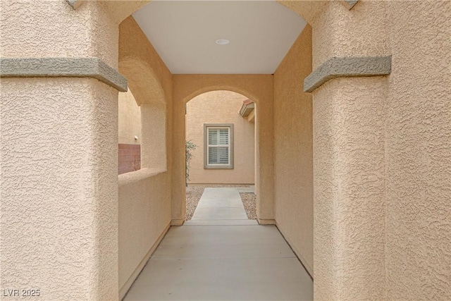 hall with arched walkways