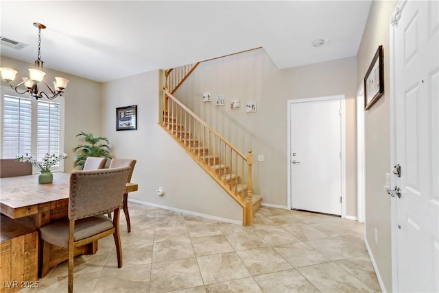 dining area featuring stairway, baseboards, visible vents, an inviting chandelier, and light tile patterned flooring