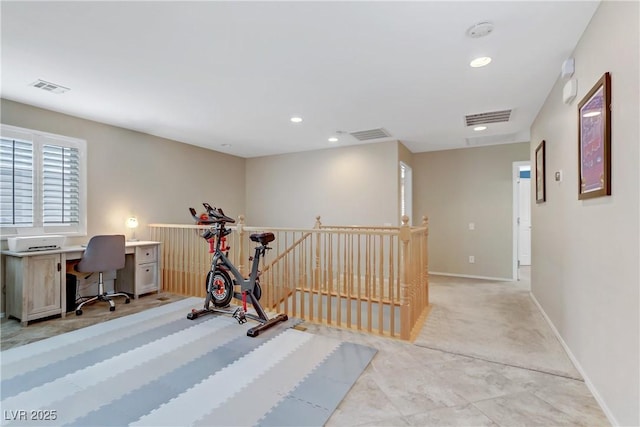 exercise area with recessed lighting, visible vents, and baseboards