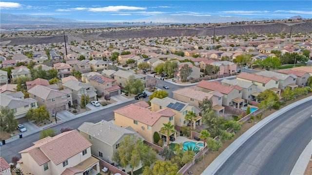 birds eye view of property with a residential view and a mountain view