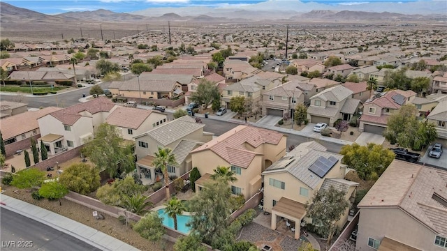 drone / aerial view with a mountain view and a residential view