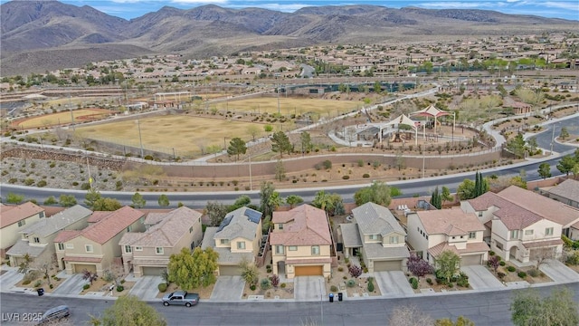 aerial view featuring a mountain view and a residential view