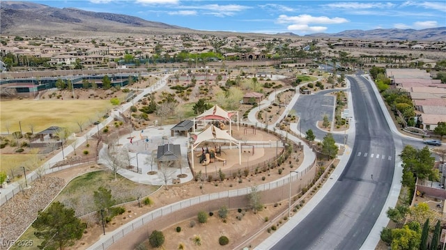 birds eye view of property with a residential view and a mountain view