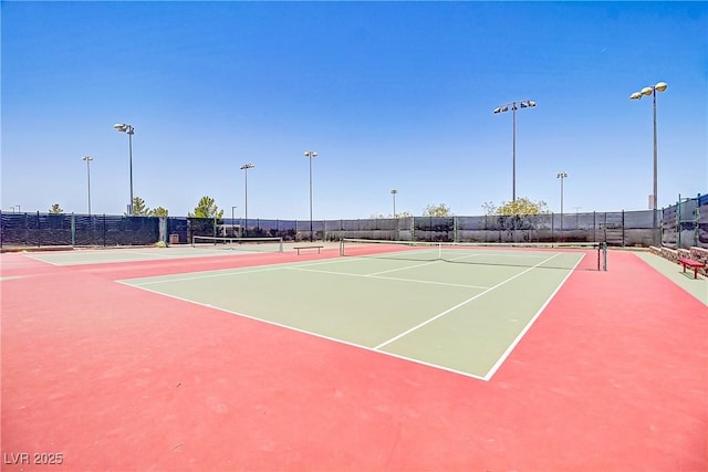 view of sport court featuring community basketball court and fence