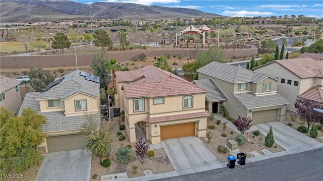 aerial view with a mountain view and a residential view