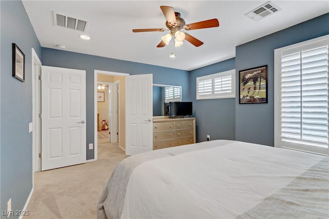 bedroom with baseboards, carpet, visible vents, and ceiling fan