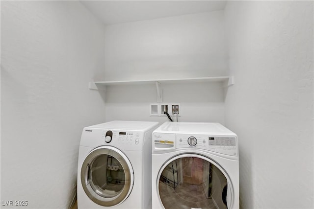 laundry area featuring laundry area and washer and dryer