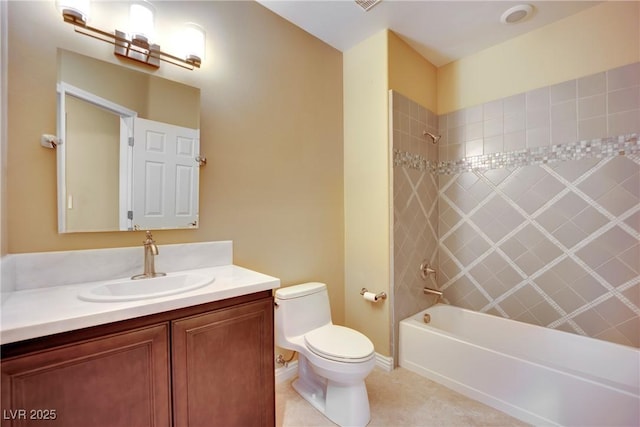 bathroom with tile patterned flooring, baseboards, toilet, shower / tub combination, and vanity