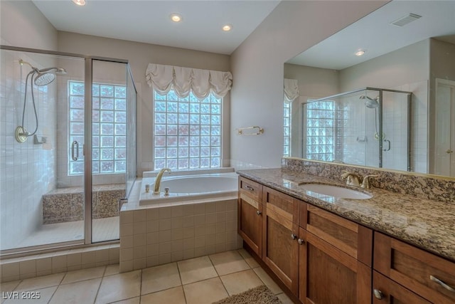 full bath featuring vanity, visible vents, a shower stall, tile patterned floors, and a bath