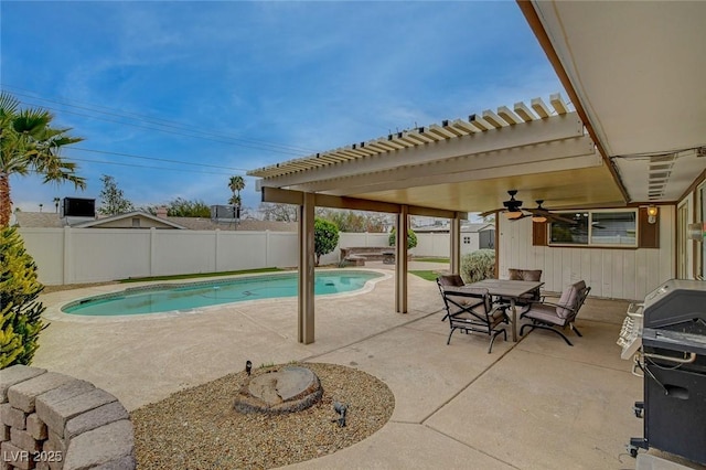 view of swimming pool featuring a fenced in pool, area for grilling, outdoor dining area, a fenced backyard, and a patio area