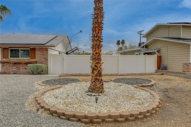 view of yard featuring a gate and fence