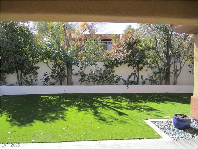 view of yard featuring fence