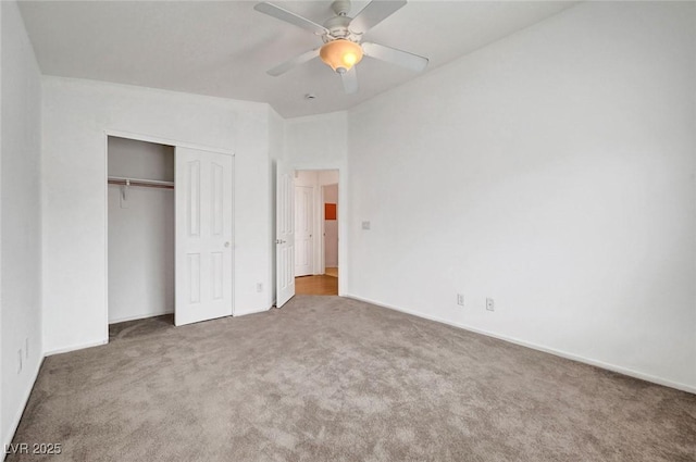 unfurnished bedroom with a closet, ceiling fan, and carpet