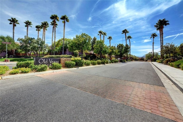 view of road with curbs and sidewalks