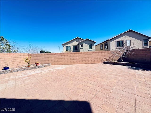 view of patio with a fenced backyard