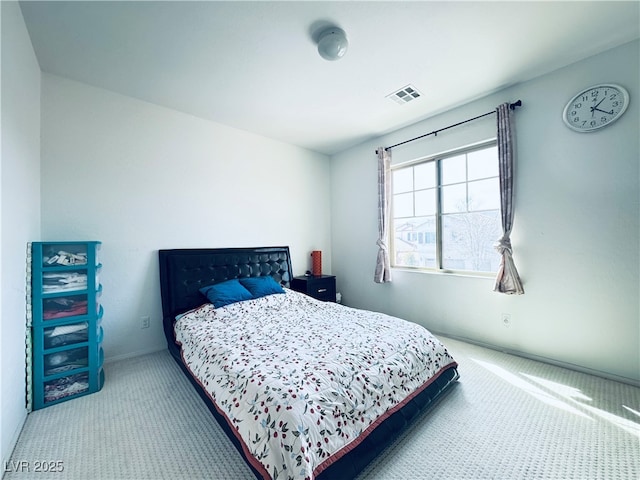 bedroom featuring carpet flooring and visible vents