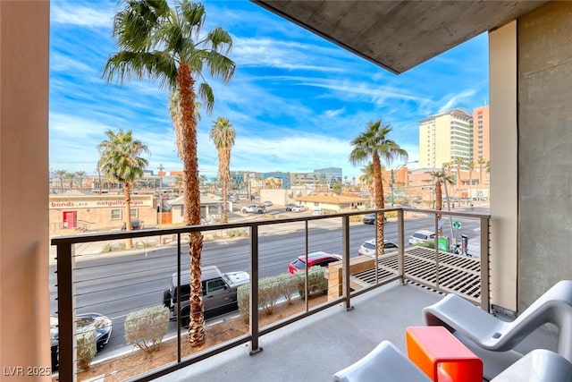 balcony featuring a view of city