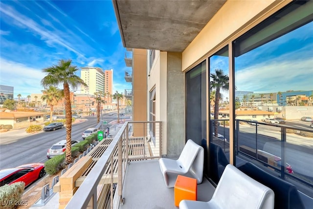 balcony featuring a city view