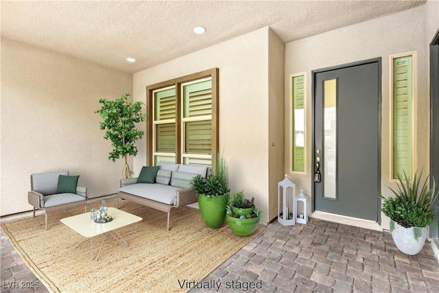 property entrance featuring stucco siding