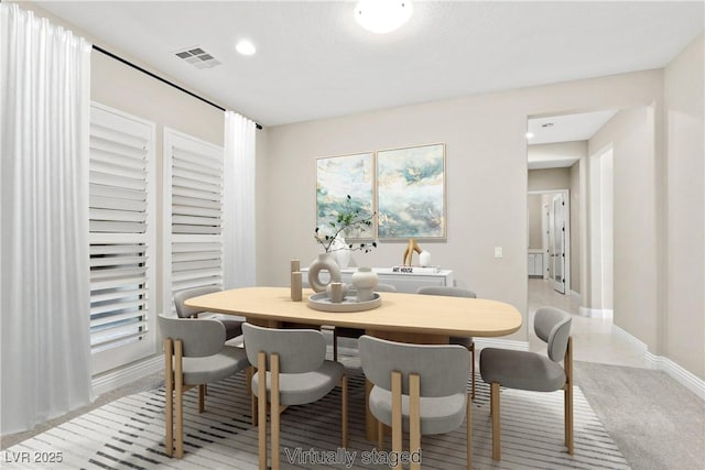 dining area with visible vents, recessed lighting, light colored carpet, and baseboards