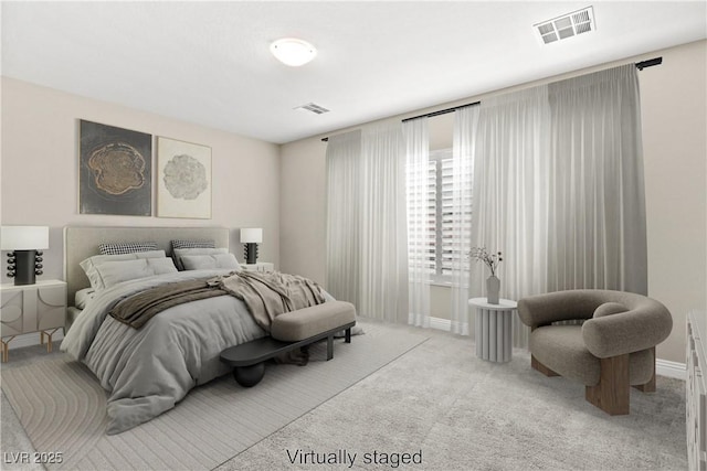 bedroom featuring carpet, visible vents, and baseboards