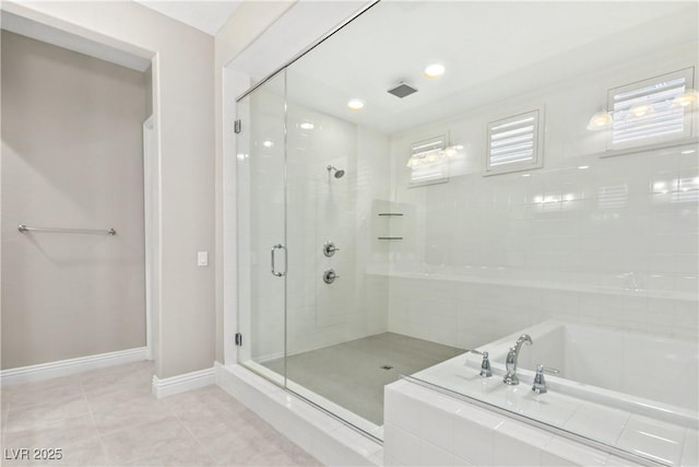 full bath with tile patterned flooring, baseboards, recessed lighting, a bath, and a shower stall