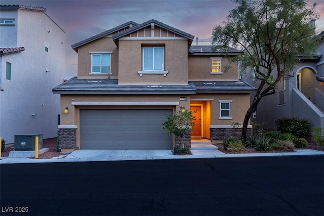 craftsman inspired home with driveway, an attached garage, stucco siding, stone siding, and central air condition unit