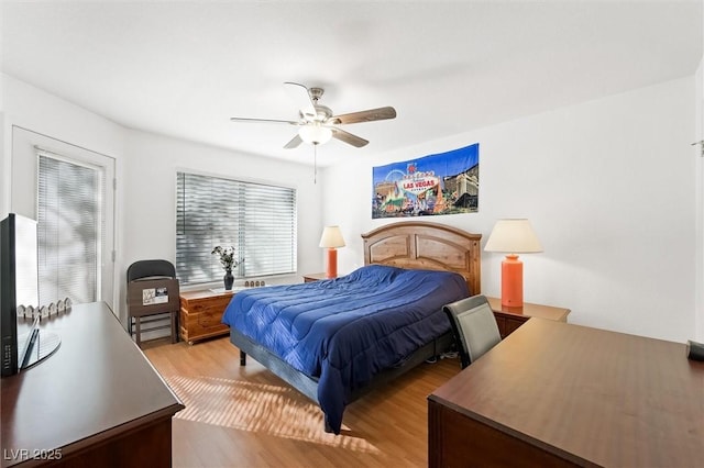 bedroom featuring ceiling fan and light wood finished floors