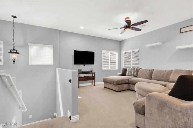 living area featuring visible vents, light carpet, recessed lighting, baseboards, and ceiling fan