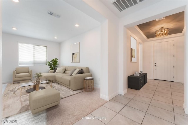 living room featuring recessed lighting, light tile patterned flooring, baseboards, and visible vents