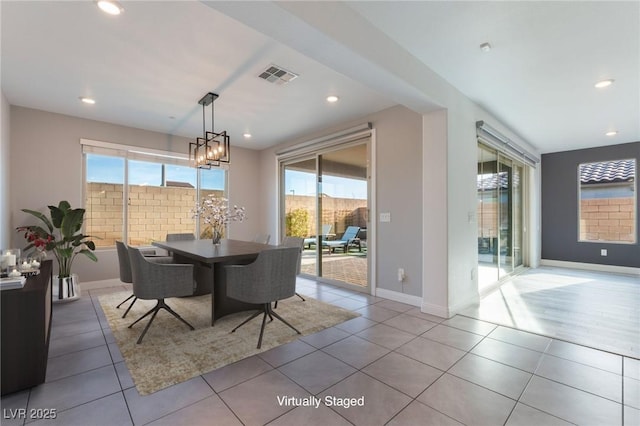 tiled dining area featuring recessed lighting, visible vents, plenty of natural light, and baseboards