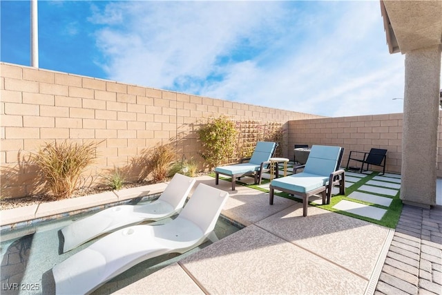 view of patio / terrace featuring a fenced backyard