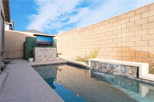 pool with a fenced backyard