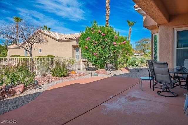 view of patio / terrace with fence