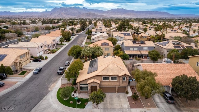 aerial view featuring a mountain view and a residential view