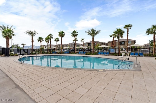 12367 Indigo Montage Rd Unit 3, Las Vegas, NV 89183 - community pool with a residential view, a patio area, and fence