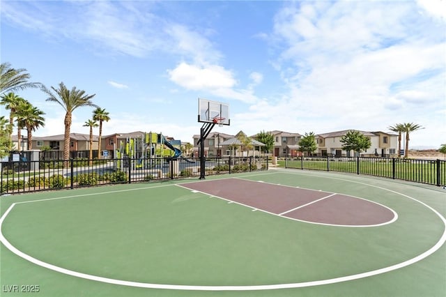 12367 Indigo Montage Rd Unit 3, Las Vegas, NV 89183 - view of sport court featuring fence, a residential view, and community basketball court