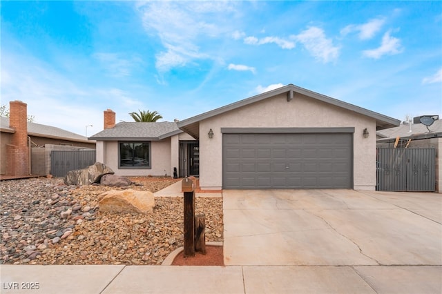 ranch-style home featuring stucco siding, concrete driveway, a garage, and fence