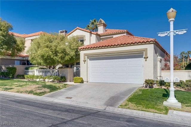 mediterranean / spanish-style home featuring fence, stucco siding, concrete driveway, a garage, and a tile roof