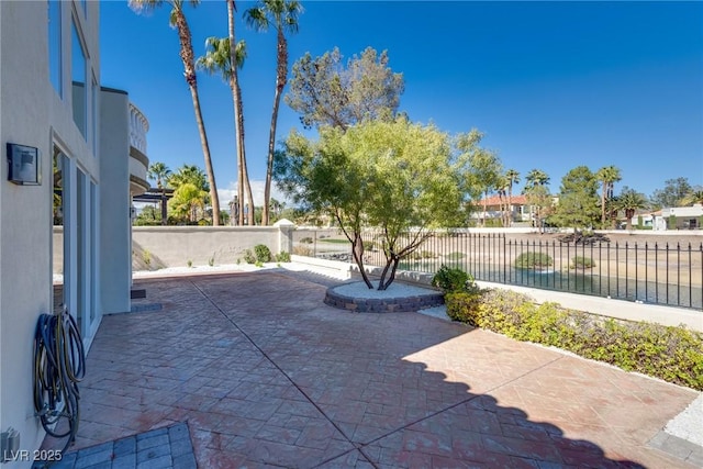 view of patio / terrace with fence