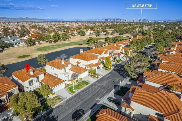 aerial view with a residential view and a water view