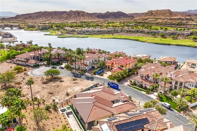 bird's eye view featuring a residential view and a water and mountain view