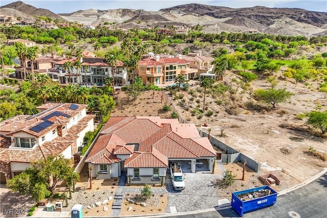 drone / aerial view with a residential view and a mountain view