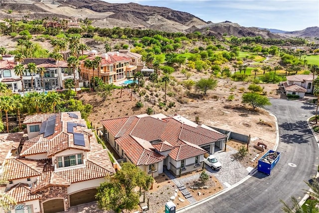 aerial view with a mountain view and a residential view